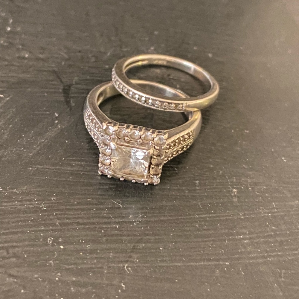 From Kay’s. White Sapphire wedding set.